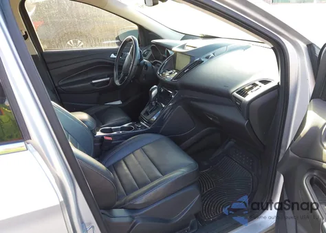 2014 Ford Escape Titanium z USA, uszkodzony, nr VIN 1FMCU0JXXEUC19573